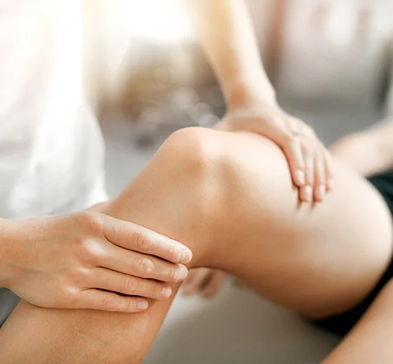 Person getting treatment on knee
