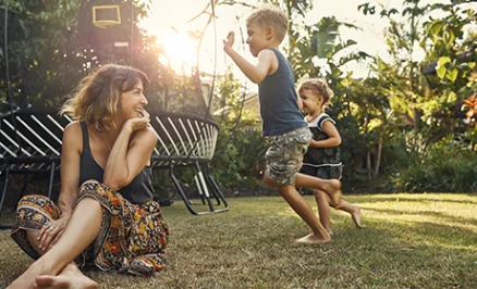 Mother and Kids Playing